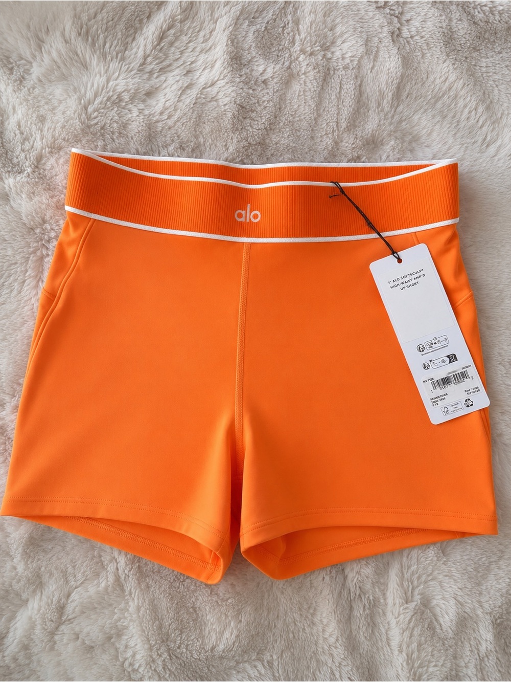 ALO Yoga Women's High-Rise Bike Shorts in Bright Orange